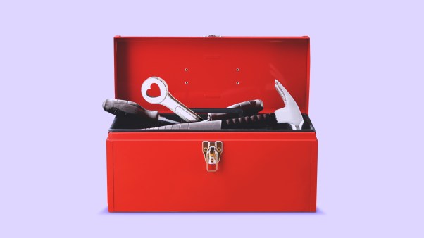 A toolbox with a heart shape at the end of a wrench