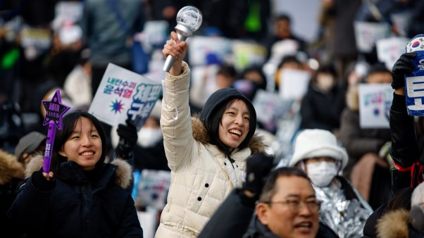 Thousands of people protest in Seoul, South Korea, near President Yoon Suk Yeol's official residence calling for his arrest after his impeachment.