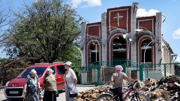 Worshippers leave Sunday service at Sukovska Baptist church in Ukraine.