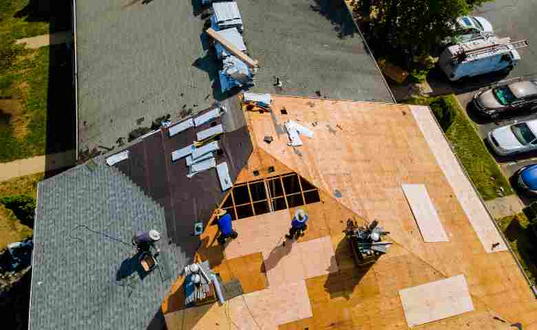 A professional team working on roofing construction