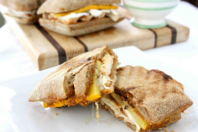 Grilled chicken panini with squash.