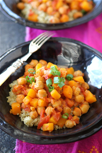 This easy vegetarian stew is rich in flavors, thanks to coconut milk, butternut squash and fresh ginger. The leftovers heat up well for lunch the next day. #vegetarianrecipes #stew #butternutsquash