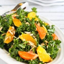 This kale salad recipe features the sweetest seasonal oranges, crunchy toasted almonds and a light Dijon vinaigrette. Plus, 5 of my favorite salad recipe ideas! 156 calories and 3 Weight Watchers Freestyle SP #weightwatchers #kale #salad