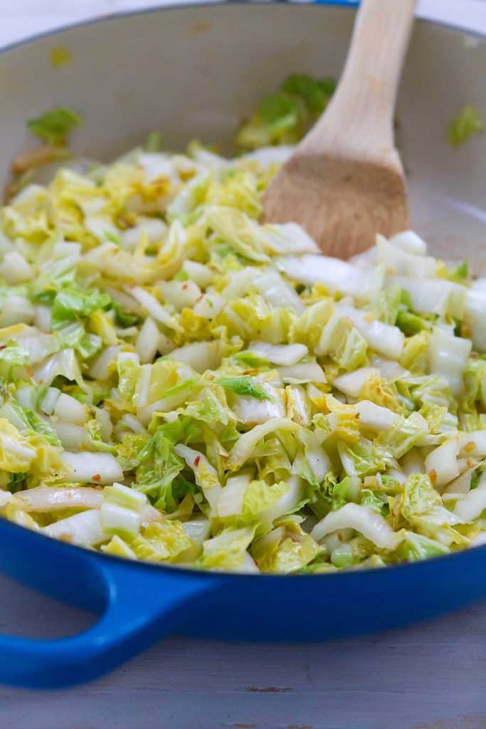 When you need a quick side dish, this 5-minute Spicy Stir-Fried Cabbage comes in handy! 54 calories and 1 Weight Watchers Freestyle SmartPoint #vegan #cabbage #weightwatchers