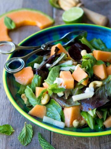 One of the best salads I have eaten in a long time! This sweet and savory Cantaloupe Goat Cheese Salad is topped off with a lime mint dressing. 174 calories and 3 Weight Watchers Freestyle SP