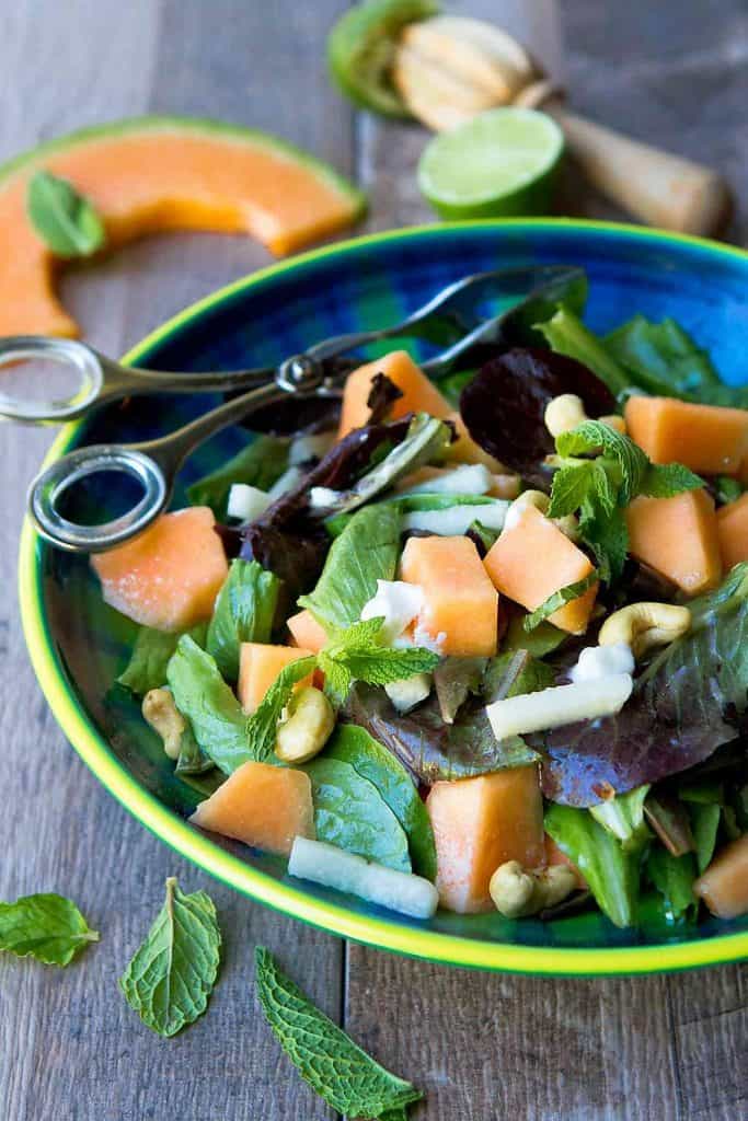 One of the best salads I have eaten in a long time! This sweet and savory Cantaloupe Goat Cheese Salad is topped off with a lime mint dressing. 174 calories and 3 Weight Watchers Freestyle SP