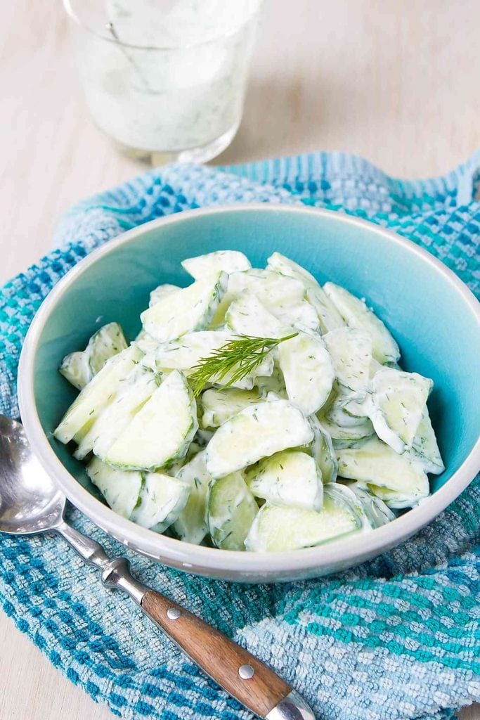 This cucumber dill salad can be whipped up in just 10 minutes! A healthy side dish for weeknights or backyard barbecues. 24 calories and 0 Weight Watchers Freestyle SP #salad #glutenfree #cucumber #recipe