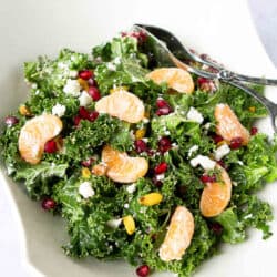 Winter fruit shines in this pretty Kale, Pomegranate and Mandarin Orange Salad. Serve it as a side dish or top it with chicken or shrimp for dinner. 98 calories and 2 Weight Watchers Freestyle SP #kale #cleaneating #weightwatchers