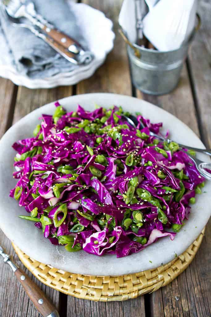 Have you ever made a slaw with snap peas? Bursting with flavor and color, this Hoisin Snap Pea & Red Cabbage Slaw is fantastic on its own or piled on sliders or tacos. 85 calories and 2 Weight Watchers Freestyle SP. #weightwatchers #slaw #healthy