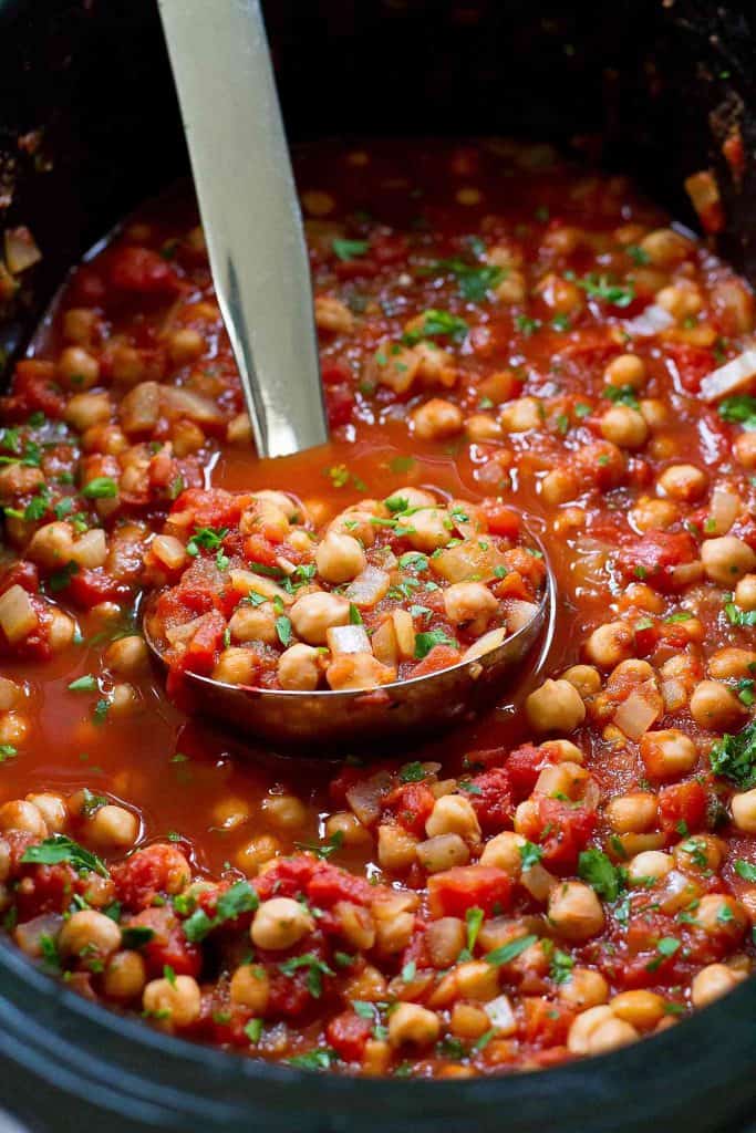 Pull out the crockpot for a batch of these vegan Slow Cooker Italian Chickpeas. Mix in some extra vegetables if you’d like and serve over rice or quinoa. 188 calories and 0 Weight Watchers SP | Crock Pot | Vegan | Vegetarian | Plant Based | Garbanzo Beans | Chana #plantbased #veganrecipes #slowcooker #crockpotrecipes #meatless #wwrecipes #smartpoints