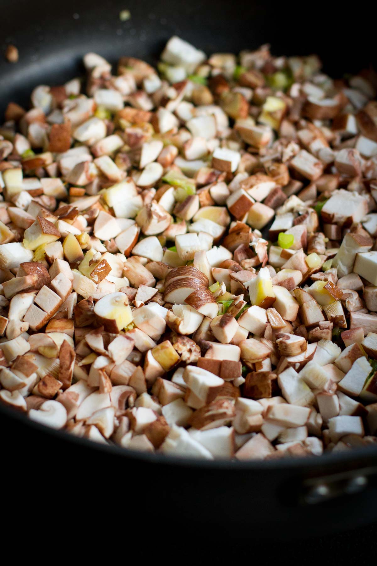 Diced mushrooms in a large nonstick skillet.