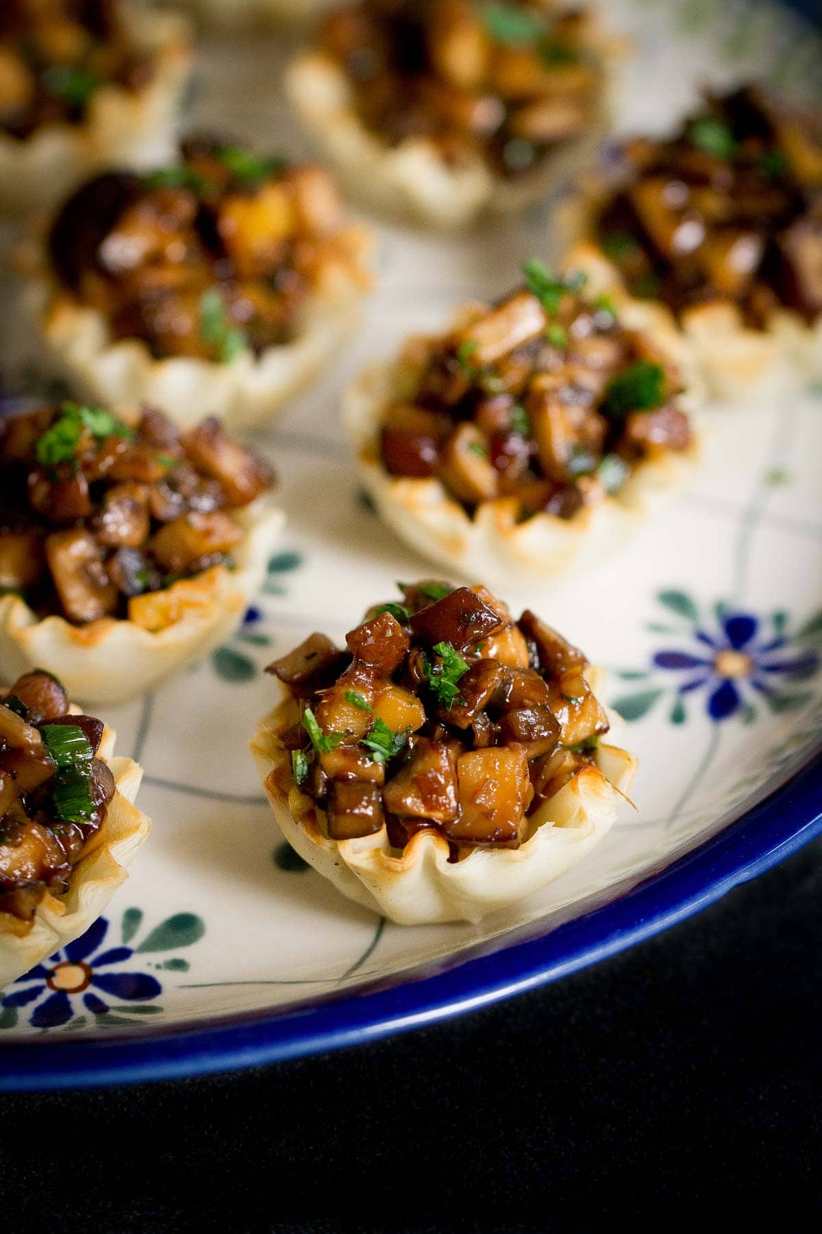 Cooked hoisin mushroom mixture stuffed into phyllo shells.