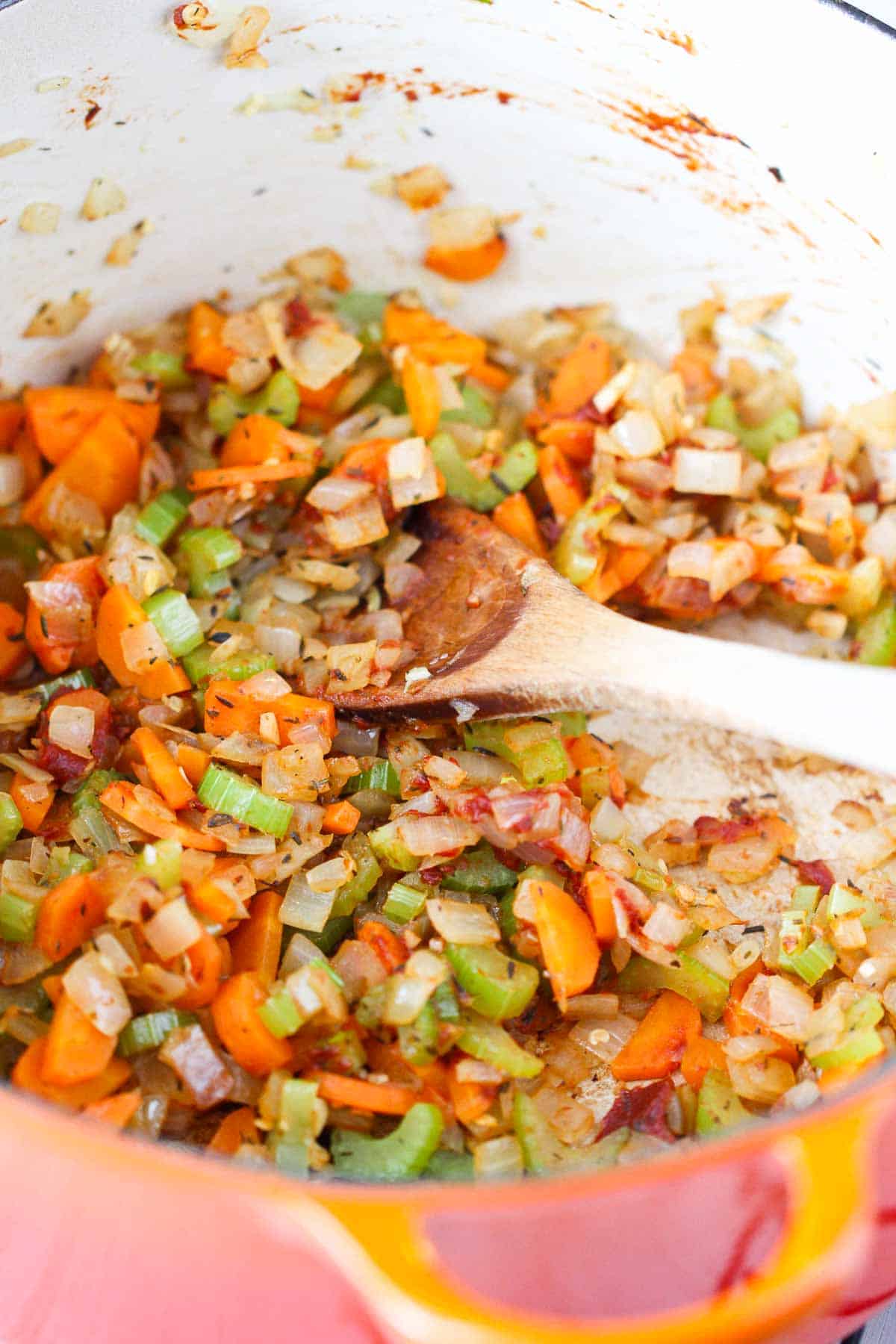 Sautéed onions, carrots and celery in a large saucepan.