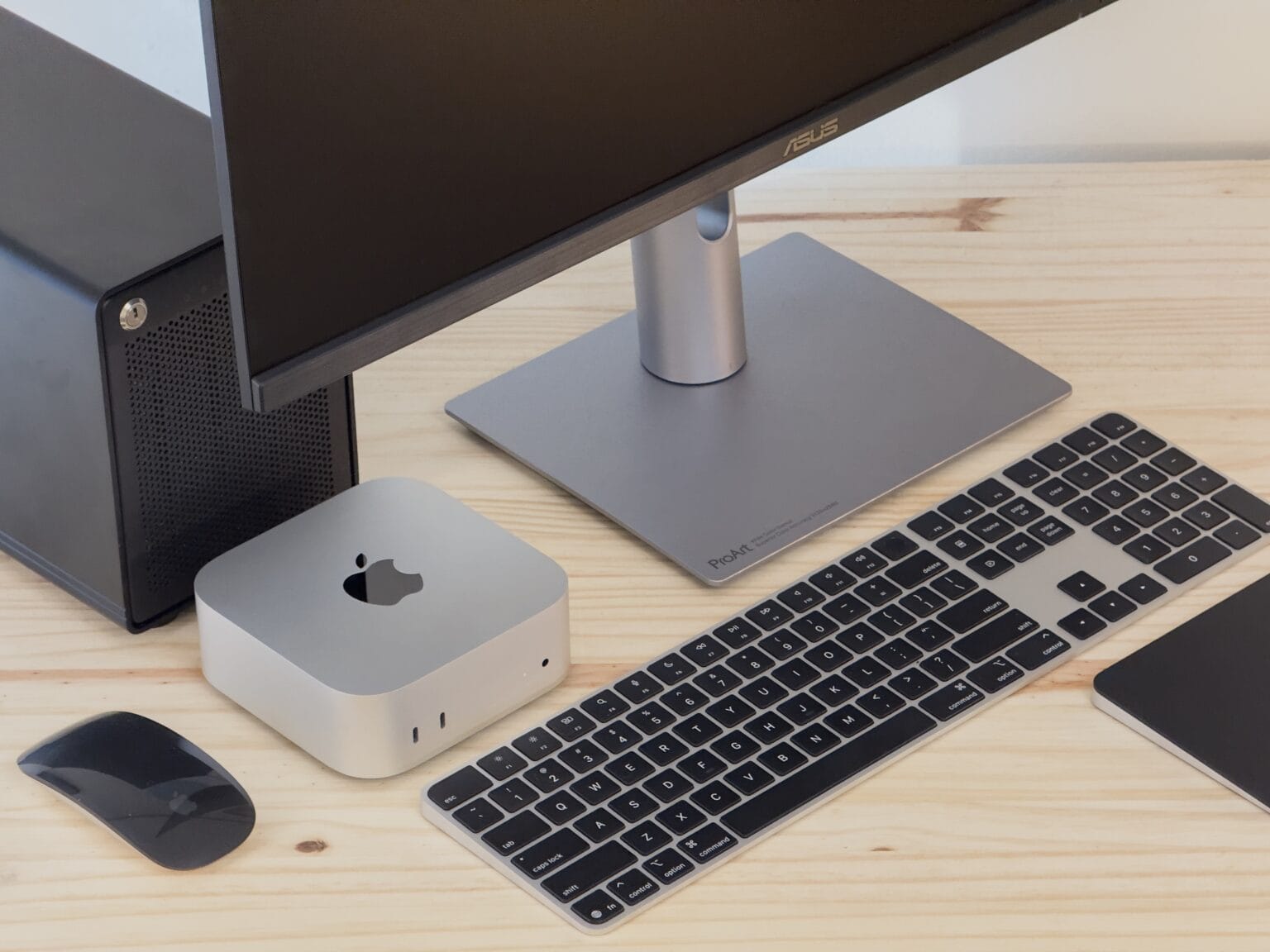 Mac mini and various peripherals photographed isometrically