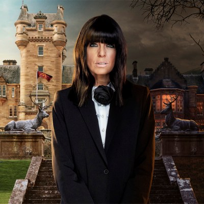 Claudia Winkleman standing in front of a castle for The Traitors series 3