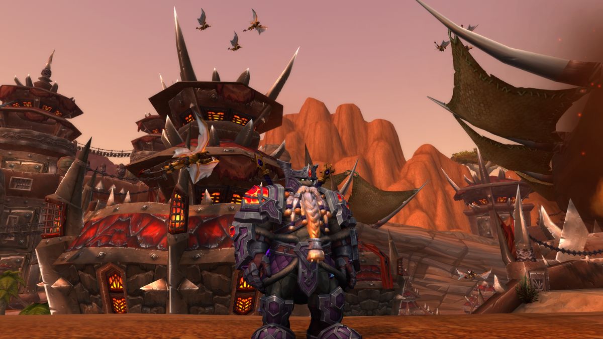 An Earthen dwarf stands in his heritage armor in front of Orgrimar