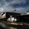 A cargo ship passes through the Miraflores locks on the Panama Canal