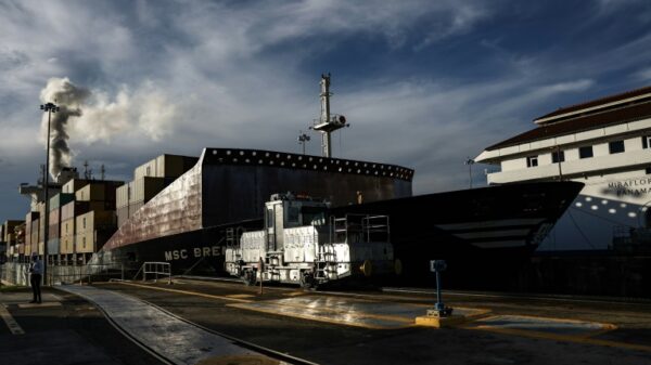 A cargo ship passes through the Miraflores locks on the Panama Canal