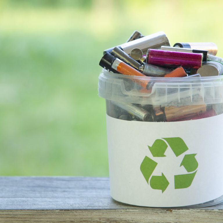 batteries in a recycling bucket