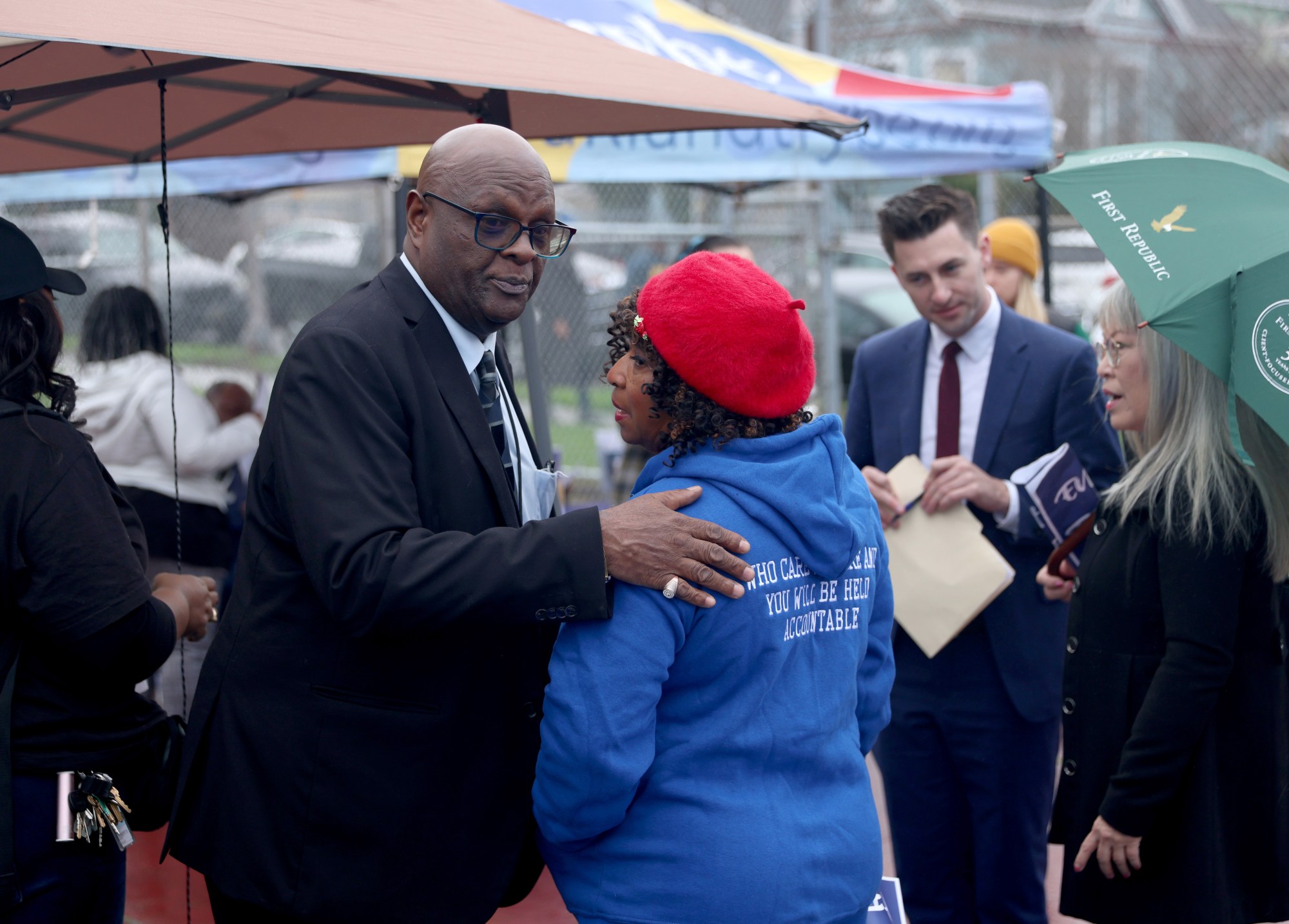 Alameda County District Attorney Pamela Price, right, talks with her boyfriend Antwon Cloird during a rally and resource fair at San Antonio Park in Oakland, Calif., on Wednesday, Jan. 24, 2024. Price marched with other members of the D.A.'s office and community members to raise awareness of human trafficking. (Jane Tyska/Bay Area News Group)