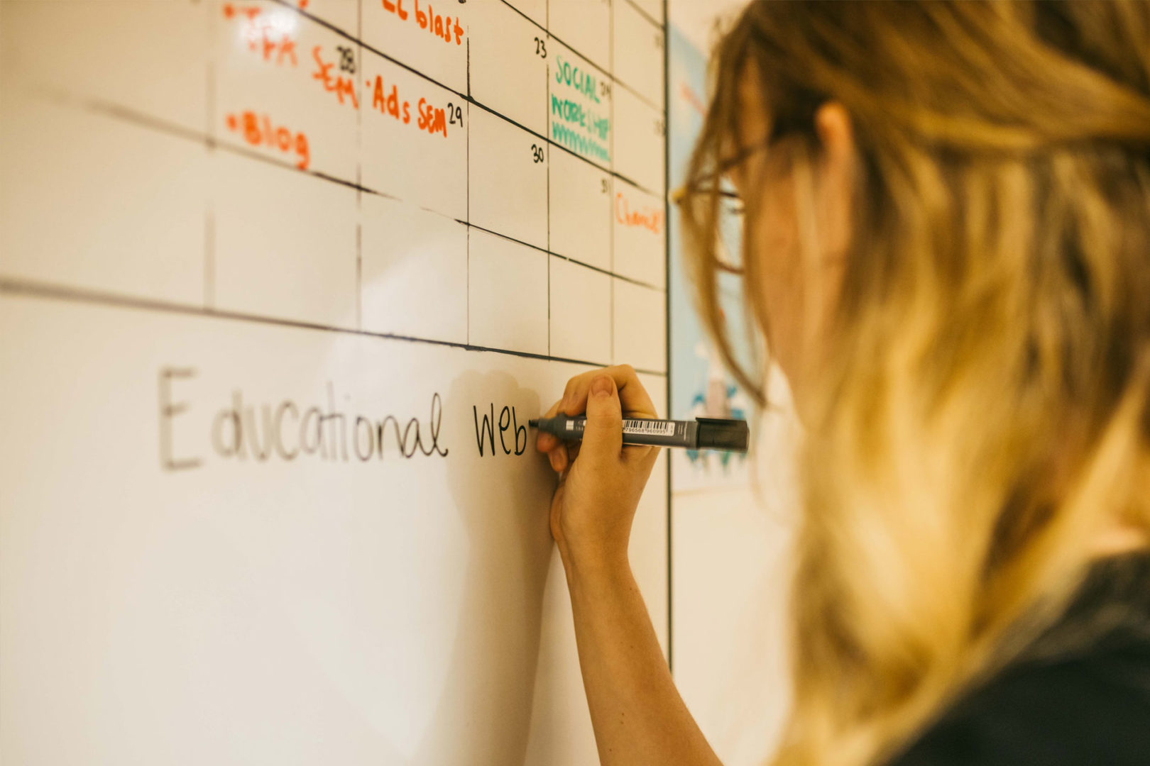 Sarah writing on the whiteboard