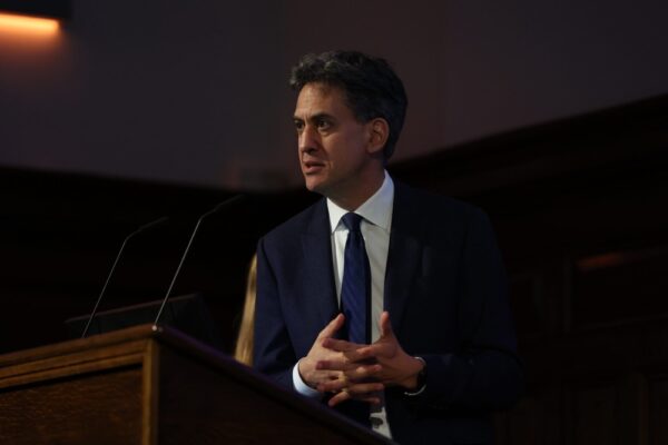 Ed Miliband speaks from behind a lectern at Energy UK's Annual Conference