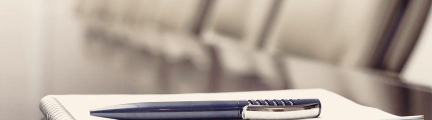 Writing pen on a table in an office