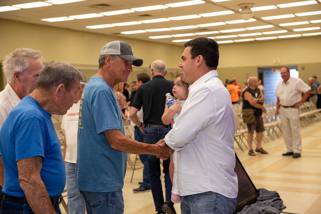 EQT CEO shaking hands with landowner 