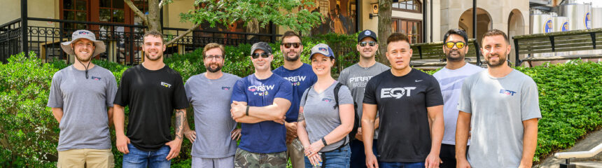 Group of EQT employees standing