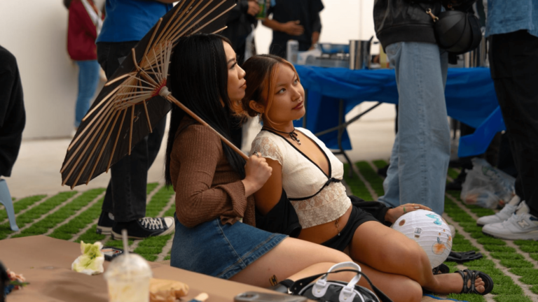 two women posing for photo