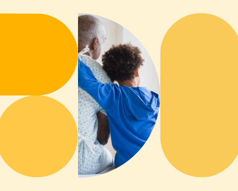 Photo of an older man wearing a hospital gown being hugged by a younger boy, both with their backs towards the camera. Image is on a light yellow background, surrounded by darker yellow circle and pill shapes.