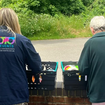 GOTO Events staff sorting out food for charity