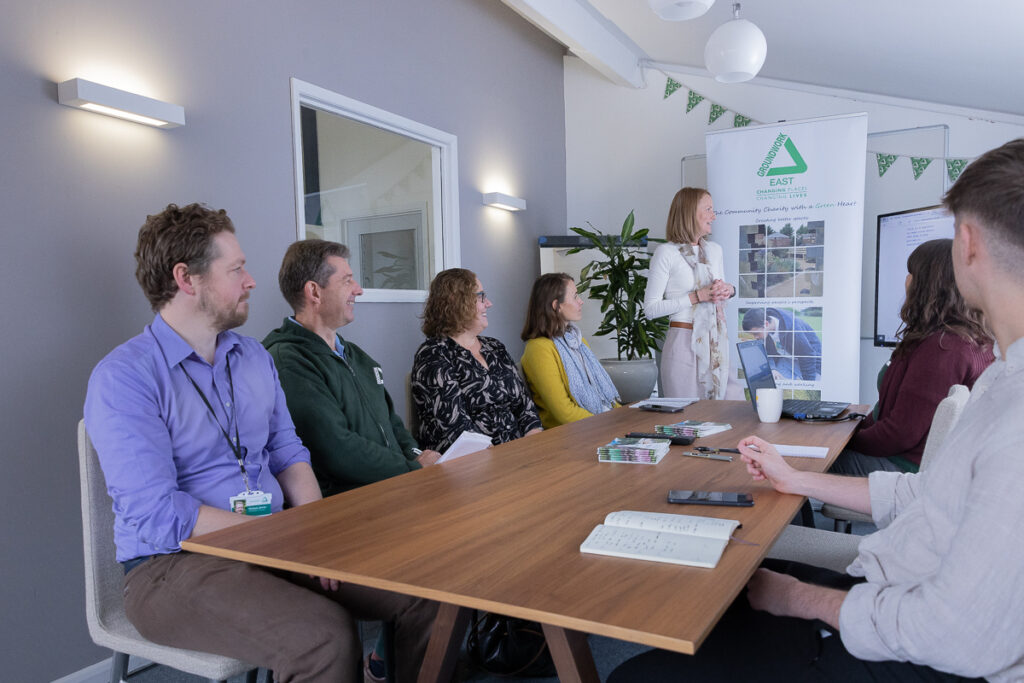 Sustainability Consultants chatting round a table