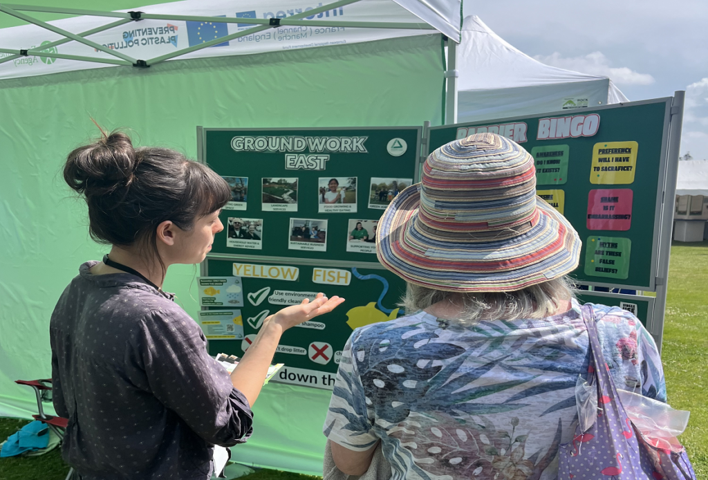 Groundwork staff talking to an interested party at an event