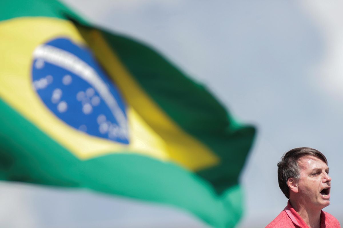 Brazil's President Jair Bolsonaro joins supporters protesting against quarantine and social distancing measures due to COVID.