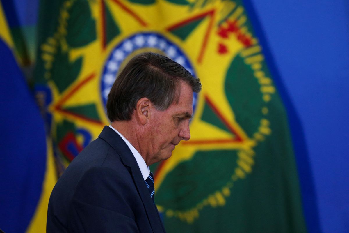 Brazil's President Jair Bolsonaro walks during a ceremony at the Planalto Palace in Brasilia, Brazil February 2, 2022.