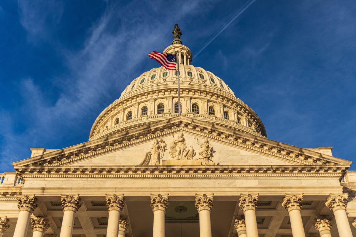 ​US Capitol building at in the morning sun. Washington DC, USA The US Capitol building in the early morning at sunset.