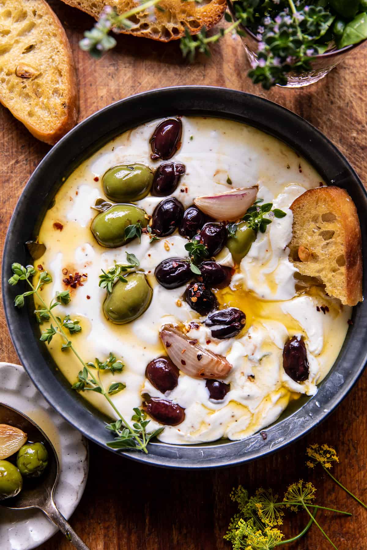 Honey Whipped Feta with Garlic Herb Roasted Olives | halfbakedharvest.com