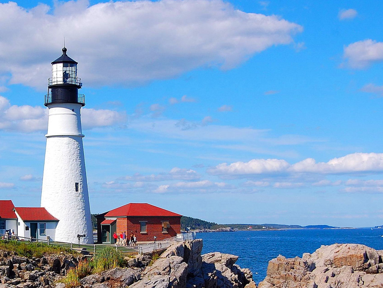 lighthouse overlooking shoreline