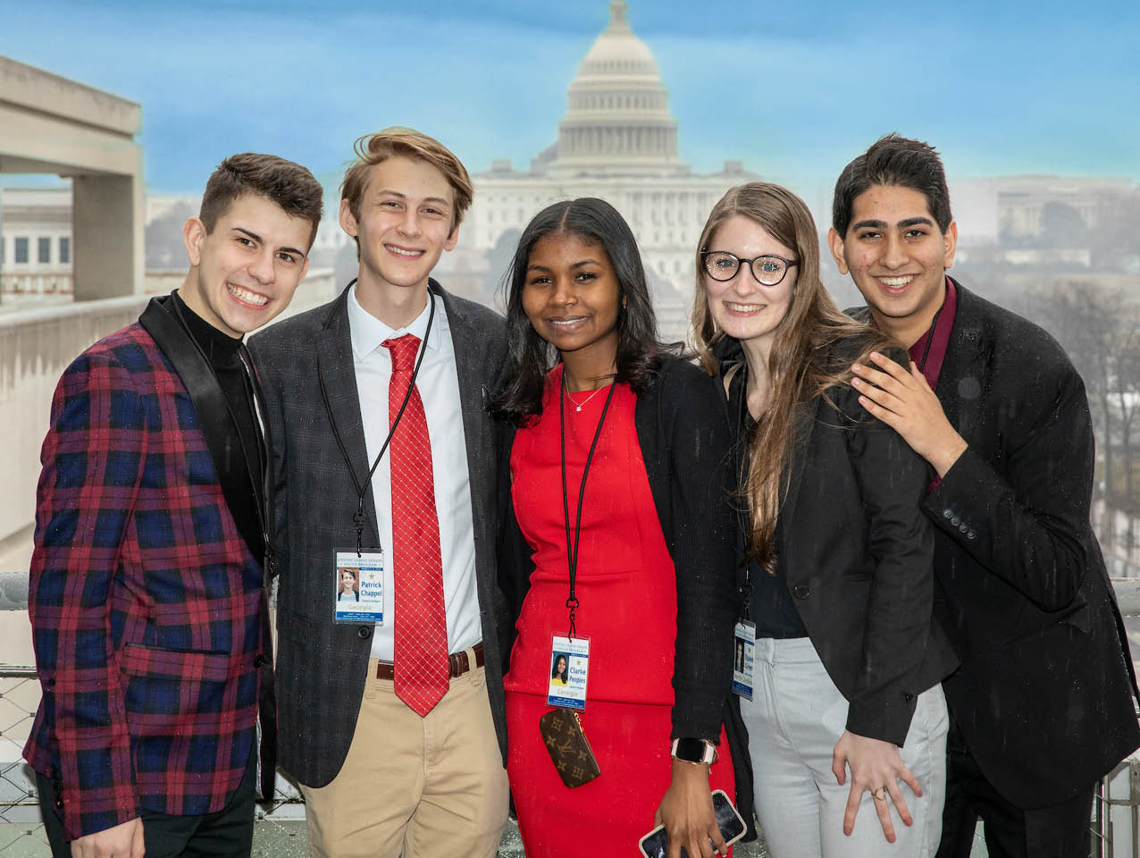 Five members of the United States Senate Youth Program smiling