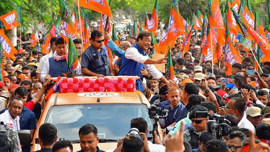 Assam CM Himanta Biswa Sarma during a roadshow in Sivasagar, Assam.(PTI)