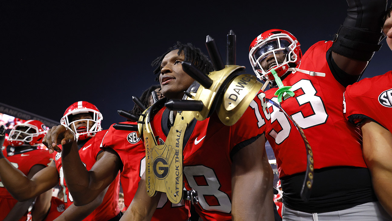 Chris Cole 18 of the Georgia Bulldogs celebrates with teammates after recovering a fumble during the fourth quarter against the Tennessee Volunteers at Sanford Stadium on November 16, 2024 in Athens, Georgia. Georgia defeated Tennessee 31-17.