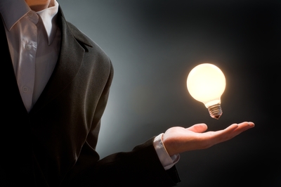 Man with bulb in hand.jpg