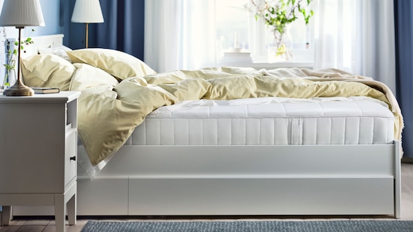 A medium firm/white VESTERÖY hybrid mattress