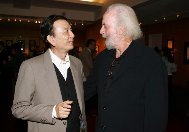 BEVERLY HILLS, CA - NOVEMBER 18: Screenwriter Robert Towne (right) talks with actor James Hong at The Academy of Motion Picture Arts and Sciences' 30th anniversary screening of Best Picture Nominee "Chinatown"  presented as part of the Academy's Gold Standard series on November 18 2004 in Beverly Hills, California. (Photo by Frazer Harrison/Getty Images) *** Local Caption *** Robert Towne;James Hong