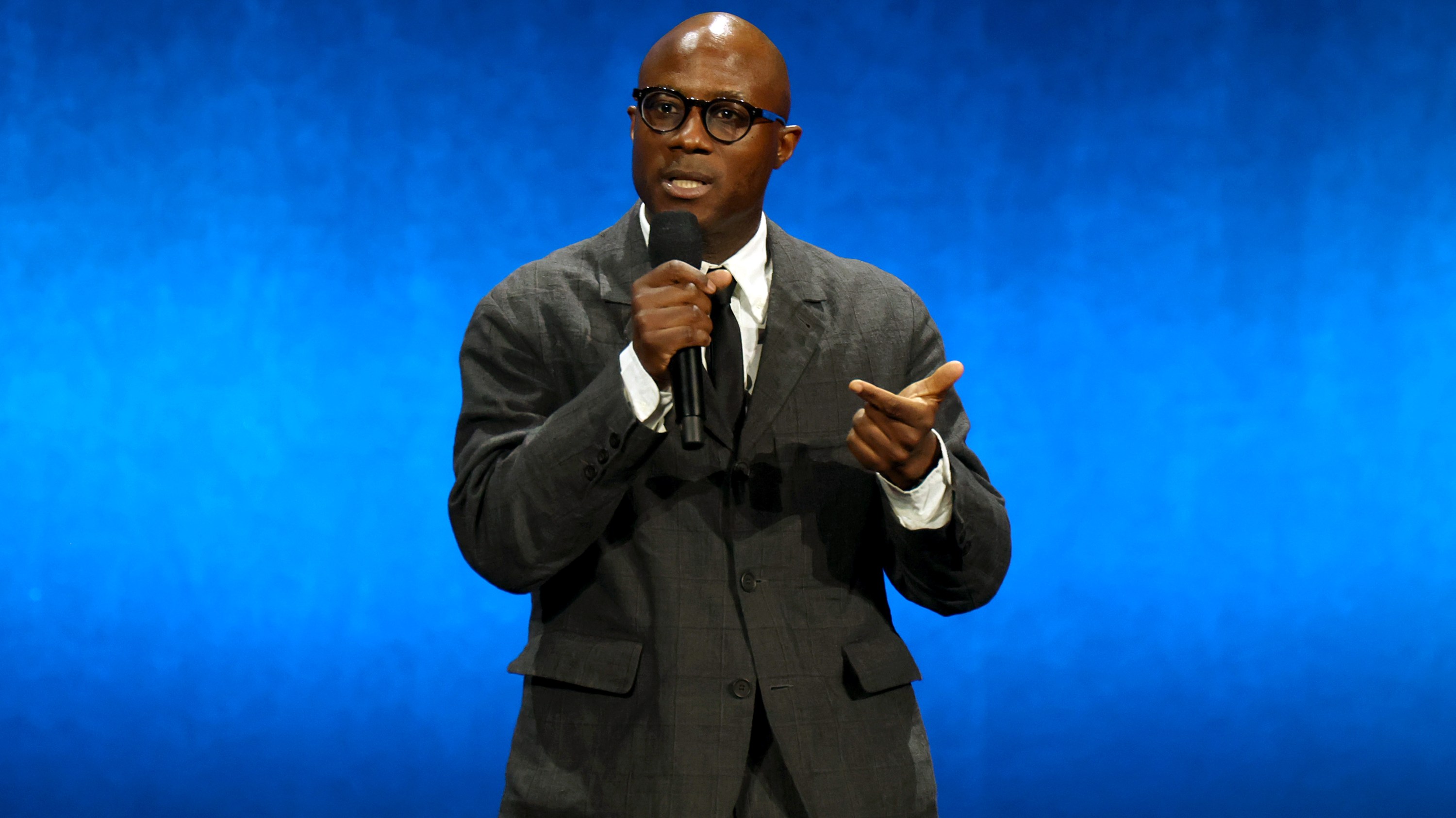 LAS VEGAS, NEVADA - APRIL 11: Barry Jenkins speaks onstage at the Walt Disney Studios Presentation during CinemaCon 2024 at The Colosseum at Caesars Palace on April 11, 2024 in Las Vegas, Nevada.  (Photo by Gabe Ginsberg/Getty Images)