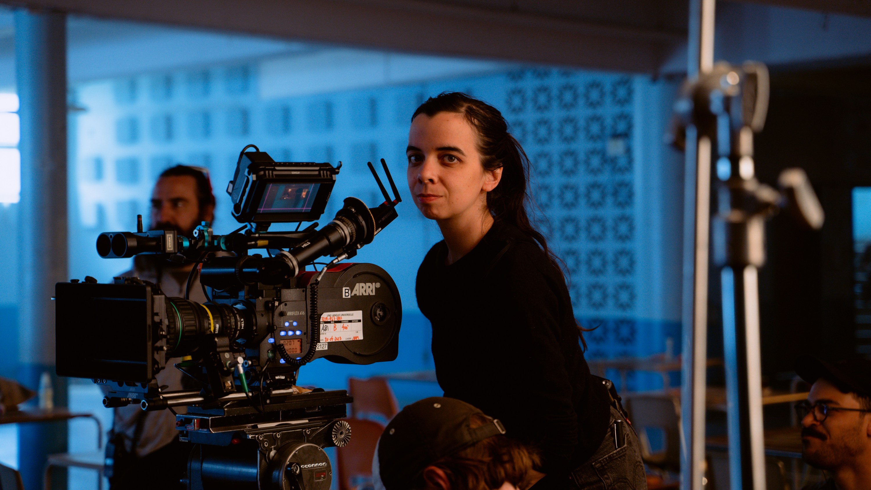 Cinematographer Isabelle Stachtchenko Sirois sitting beside her camera on the set of 'Universal Language'