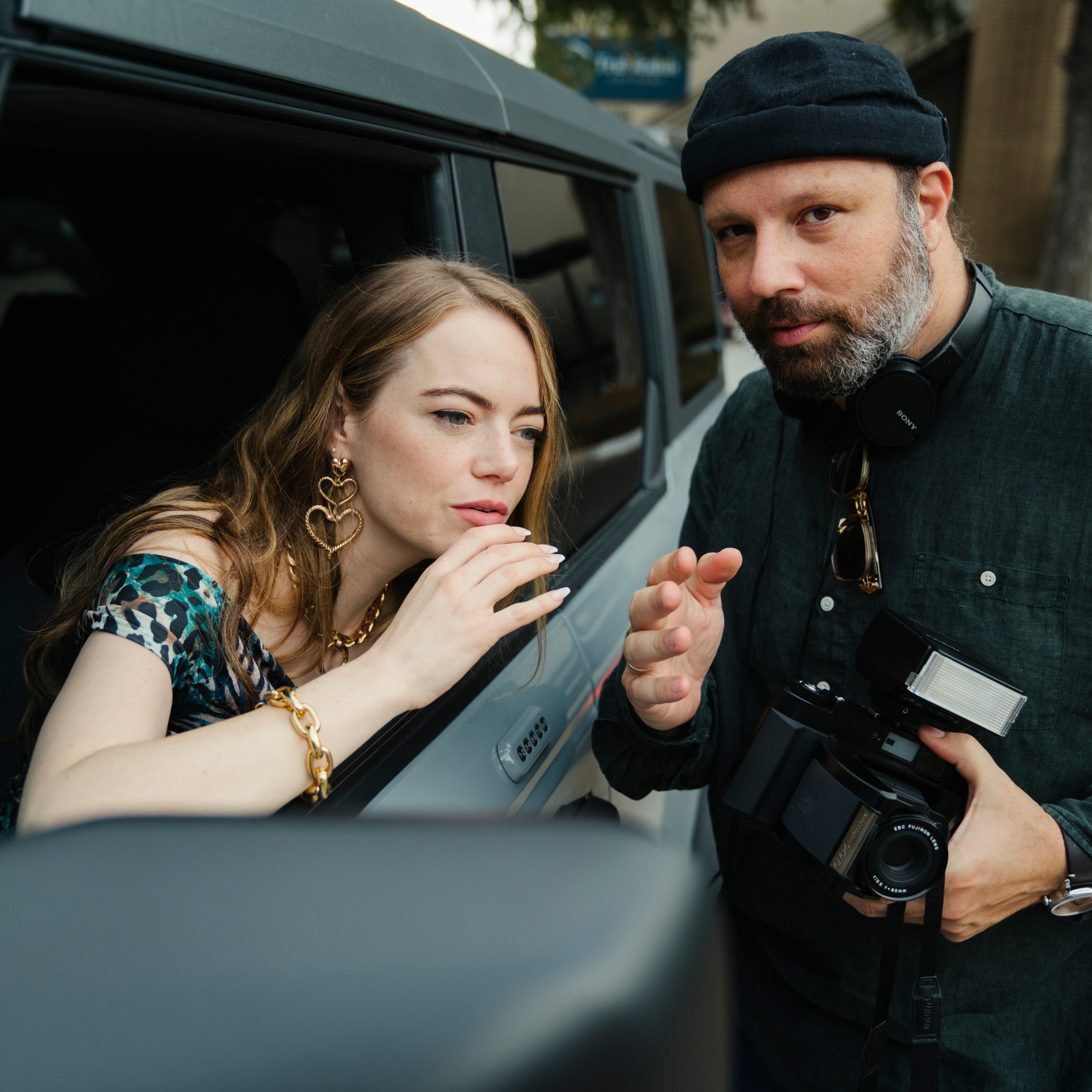 Emma Stone and Yorgos Lanthimos on the set of KINDS OF KINDNESS. Photo by Atsushi Nishijima. Courtesy of Searchlight Pictures. © 2024 Searchlight Pictures All Rights Reserved