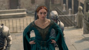 A red-haired woman in a green medieval dress; still from 'House of the Dragon'