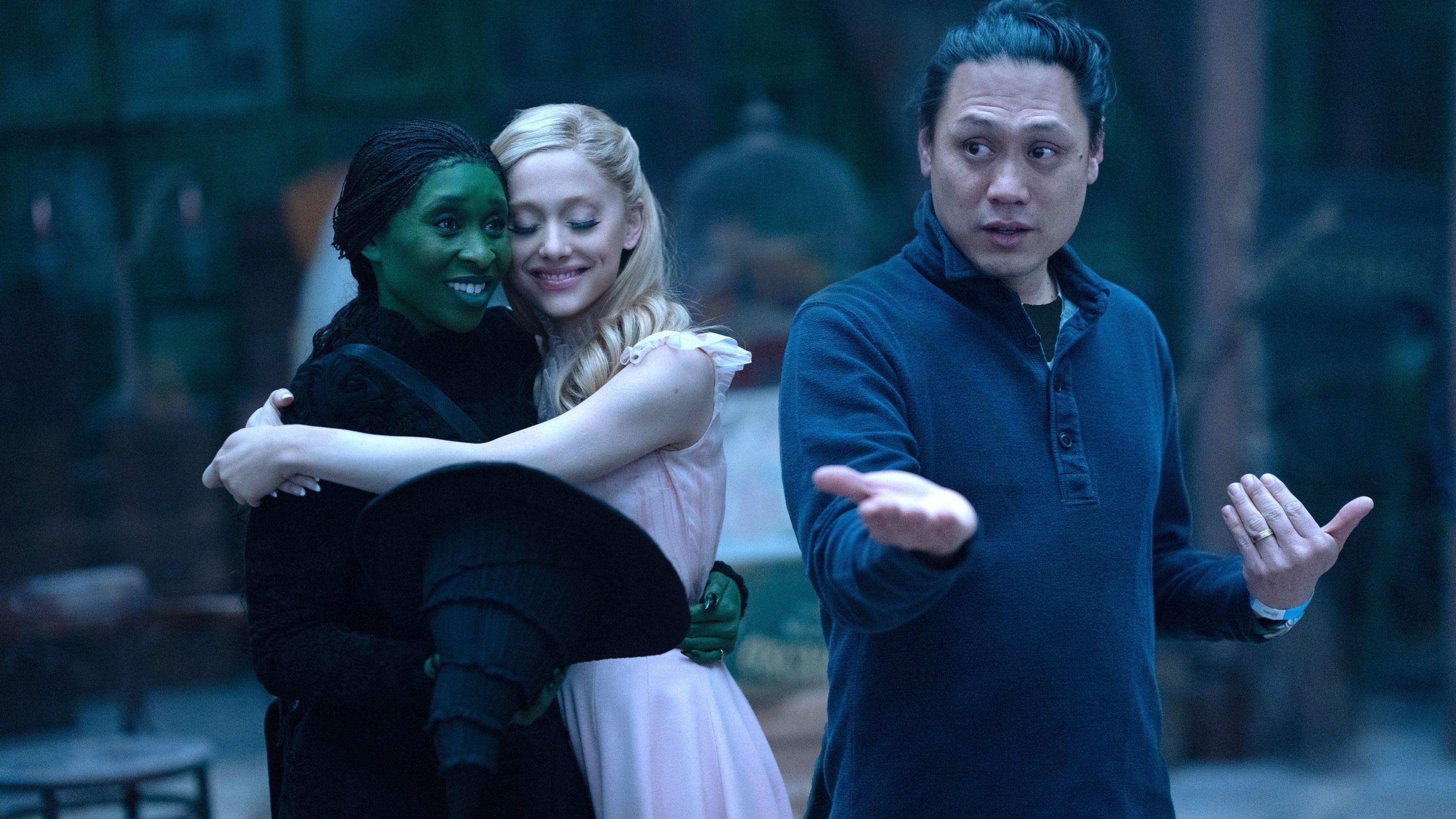 Cynthia Erivo, Ariana Grande, director Jon M. Chu, on set of 'Wicked'